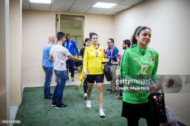 Jordanian Goalkeeper Salma Ghazal, defender Haya Khalil, followed by the rest of the National Womens Football team are being welcomed with flowers...