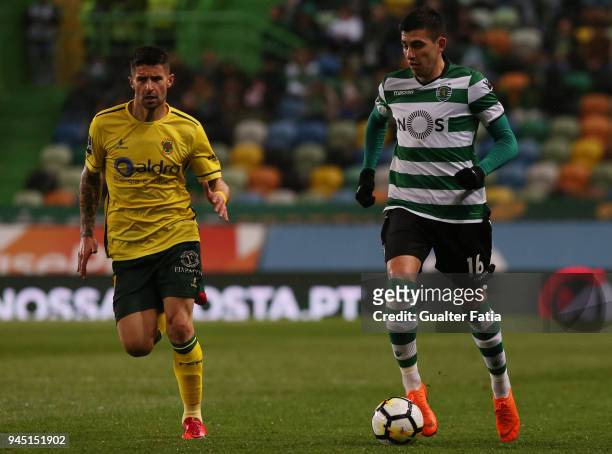 Sporting CP midfielder Rodrigo Battaglia from Argentina fights for the ball with FC Pacos de Ferreira forward Bruno Moreira from Portugal during the...