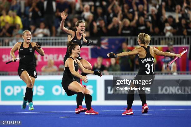 Stacey Michelsen of New Zealand celebrates victory with team mates after scoring last in the penalty shoot out during Women's Semi Final Hockey match...