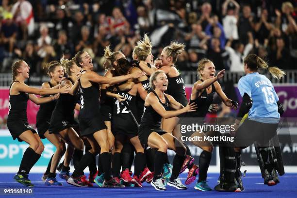 New Zealand celebrates victory after scoring last in the penalty shoot out during Women's Semi Final Hockey match between England and New Zealand on...