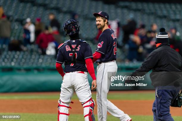 Catcher Yan Gomes of the Cleveland Indians and closing pitcher Andrew Miller celebrate after winning the game against the Detroit Tigers at...