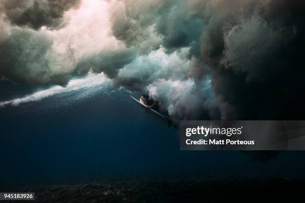 surfer dives deep - duck dive stock pictures, royalty-free photos & images