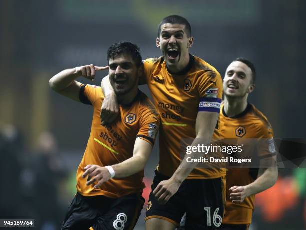 Ruben Neves of Wolverhampton Wanderers celebrates with team mate Conor Coady after scoring a brilliant second half goal during the Sky Bet...