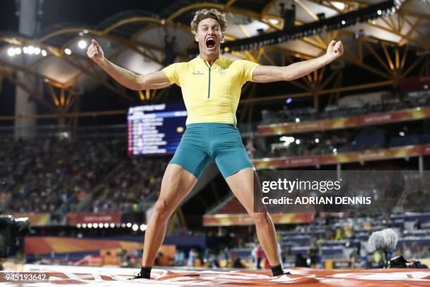 Australias Kurtis Marschall celebrates in the athletics men's pole vault final during the 2018 Gold Coast Commonwealth Games at the Carrara Stadium...