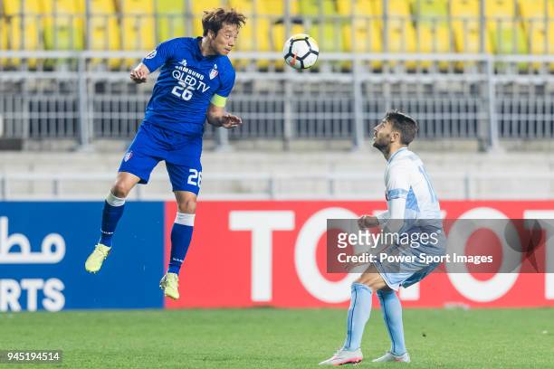 Yeom Ki-Hun of Suwon Samsung Bluewings fights for the ball with Milos Ninkovic of Sydney FC during the AFC Champions League 2018 Group H match...