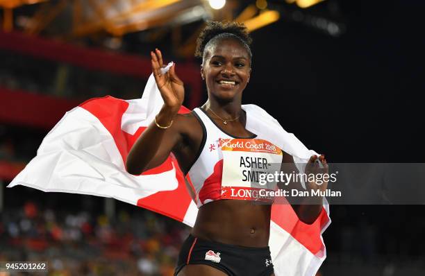 Dina Asher-Smith of England celebrates winning bronze in the Women's 200 metres final during athletics on day eight of the Gold Coast 2018...