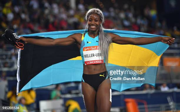 Shaunae Miller-Uibo of the Bahamas celebrates winning gold in the Women's 200 metres final during athletics on day eight of the Gold Coast 2018...