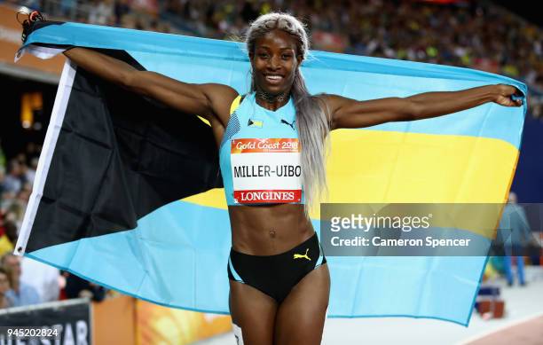 Shaunae Miller-Uibo of the Bahamas celebrates winning gold in the Women's 200 metres final during athletics on day eight of the Gold Coast 2018...