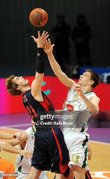 Tiago Splitter, #21 of Caja Laboral competes with Gasper Vidmar, #13 of Union Olimpija Ljubljana during the Euroleague Basketball Regular Season...