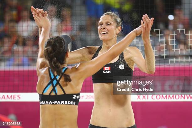 Sarah Pavan and Melissa Humana-Paredes of Canada celebrate winning the Beach Volleyball Women's Gold Medal match between Mariafe Artacho Del Solar...