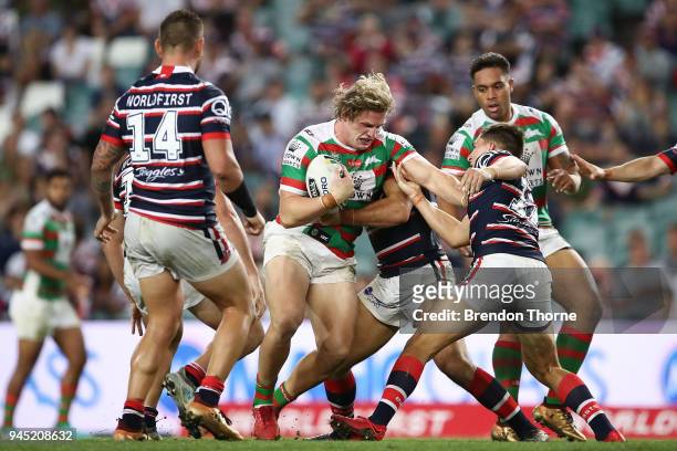 George Burgess of the Rabbitohs is tackled by Roosters defence during the round six NRL match between the Sydney Roosters and the South Sydney...