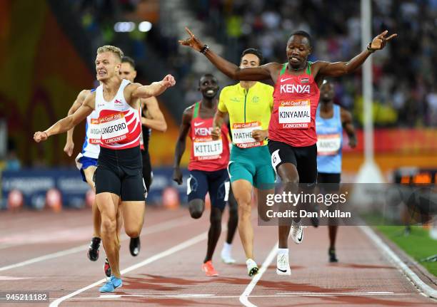 Wycliffe Kinyamal of Kenya crosses the line to win gold ahead of Kyle Langford of England in the Men's 800 metres final during athletics on day eight...