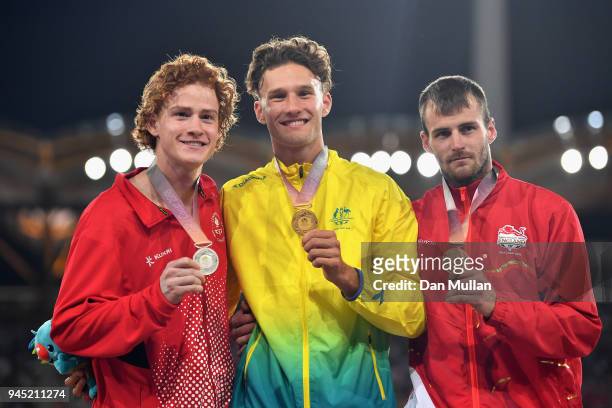 Silver medalist Shawnacy Barber of Canada, gold medalist Kurtis Marschall of Australia and bronze medalist Luke Cutts of England pose during the...
