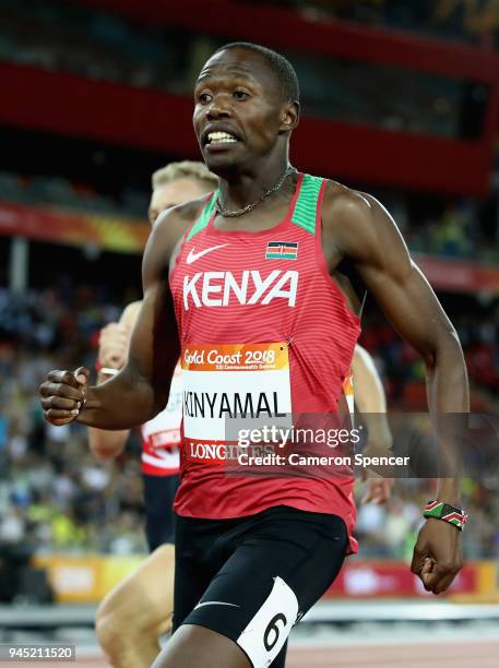 Wycliffe Kinyamal of Kenya races the line to win gold ahead of Kyle Langford of England in the Men's 800 metres final during athletics on day eight...