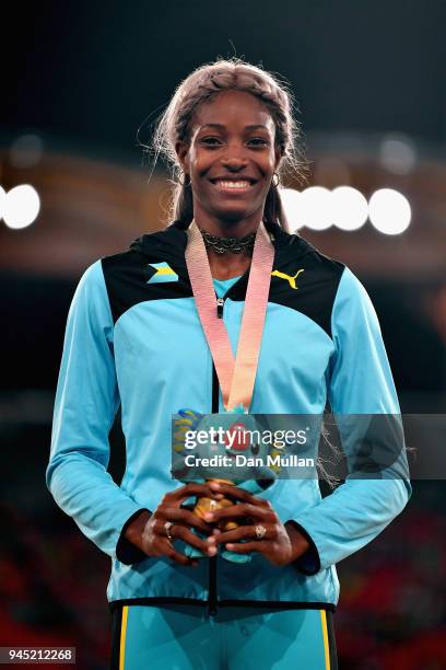 Gold medalist Shaunae Miller-Uibo of the Bahamas looks on during the medal ceremony for the Womens 200 metresduring athletics on day eight of the...