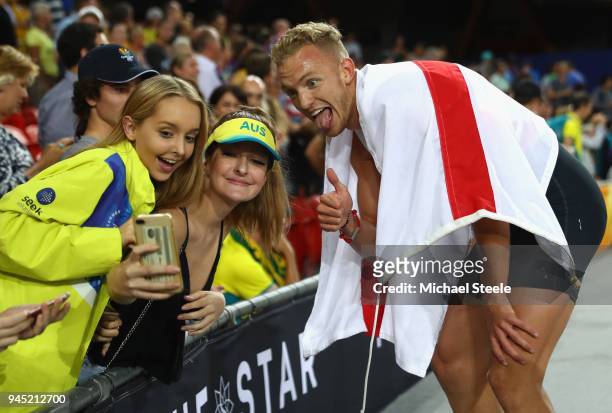 Kyle Langford of England celebrates as he wins silver with fans the Men's 800 metres final during athletics on day eight of the Gold Coast 2018...