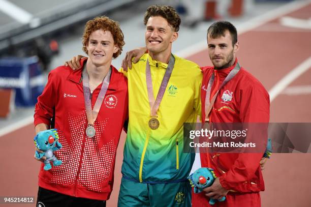 Silver medalist Shawnacy Barber of Canada, gold medalist Kurtis Marschall of Australia and bronze medalist Luke Cutts of England pose during the...