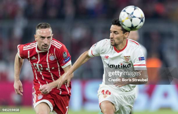 Jesus Navas of FC Sevilla is challenged by Franck Ribery of FC Bayern Muenchen during the UEFA Champions League Quarter Final second leg match...