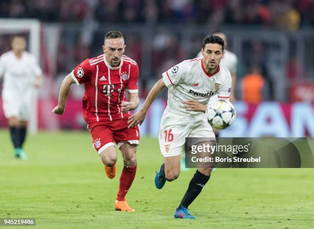 Jesus Navas of FC Sevilla is challenged by Franck Ribery of FC Bayern Muenchen during the UEFA Champions League Quarter Final second leg match...