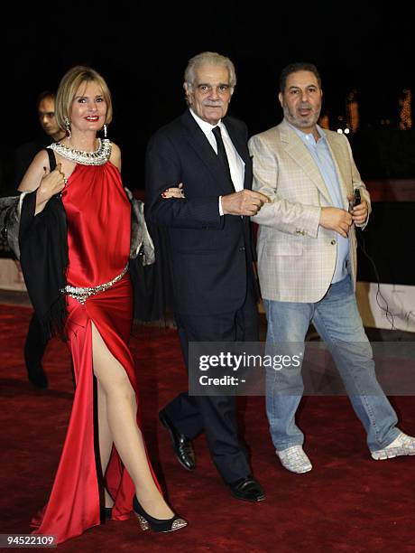 Egyptian legendary actor Omar el-Sherif and actress Yusra arrive to attend the Muhr Arab Awards ceremony at the closing night of the Dubai...