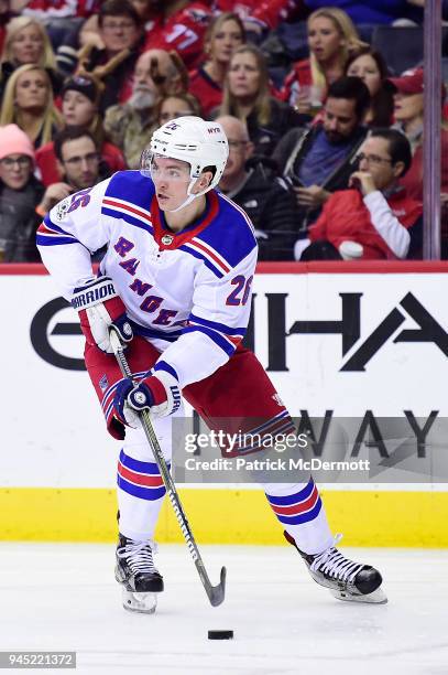 Jimmy Vesey of the New York Rangers skates with the puck in the second period against the Washington Capitals at Capital One Arena on December 8,...