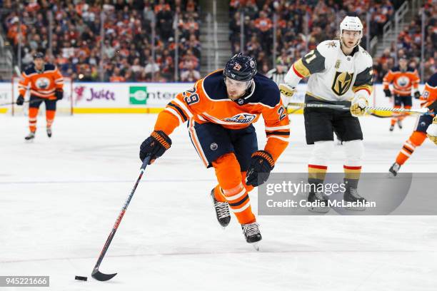 Leon Draisaitl of the Edmonton Oilers is watched by William Karlsson of the Vegas Golden Knights at Rogers Place on April 5, 2018 in Edmonton, Canada.