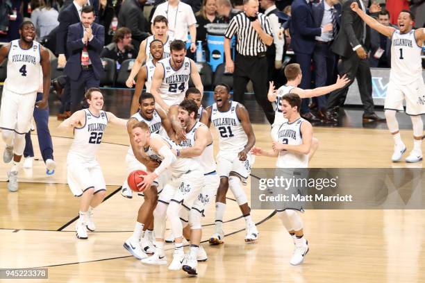 The Villanova Wildcats celebrate after defeating the Michigan Wolverines during the 2018 NCAA Photos via Getty Images Men's Final Four National...