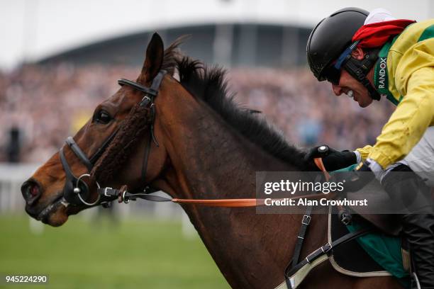 Robbie Power riding Finian's Oscar clear the last to win The Big Buck's Celebration Manifesto Novices' Chase at Aintree racecourse on April 12, 2018...