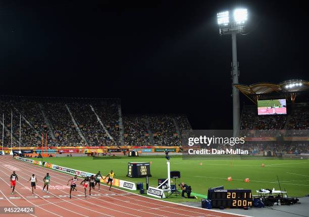 General view as Zharnel Hughes of England crosses the line to win gold ahead of Jereem Richards of Trinidad and Tobago inthe Men's 200 metres final...