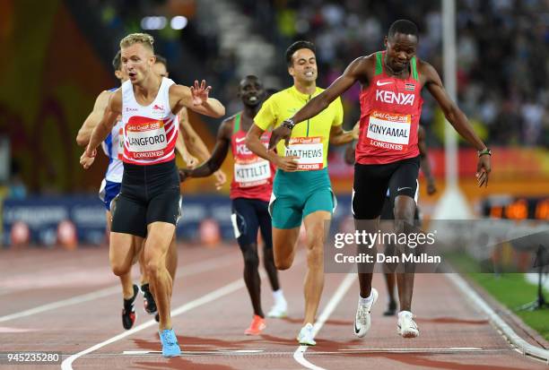 Wycliffe Kinyamal of Kenya crosses the line to win gold ahead of Kyle Langford of England in the Men's 800 metres final during athletics on day eight...