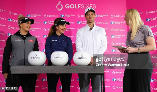 Charley Hull of England, Georgia Hall of England and Lucas Bjerregaard of Denmark speak to Presenter Jane Dougall during the draw during the...