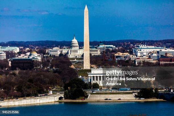 Aerial view of Washington D.C. From Top of Town restaurant, Arlington, Virginia shows Lincoln & Washington Memorial and U.S. Capitol.