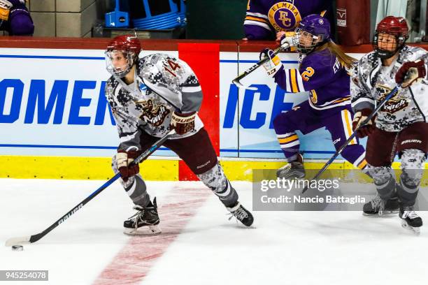 Nicole Goebel, of Norwich University gathers the puck during the Division III Women's Ice Hockey Championship held at Kreitzberg Arena on March 17,...