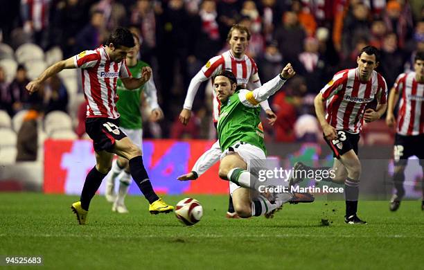 Markel Susaeta of Bilbao and Torsten Frings of Bremen compete for the ball during the UEFA Europa League Group L match between Atletico Bilbao and...