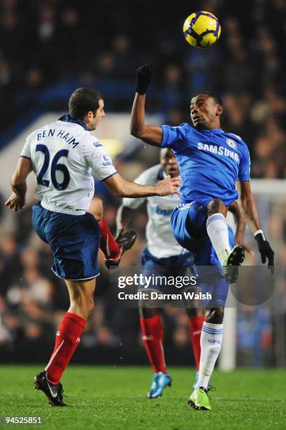 Tal Ben Haim of Portsmouth and Salomon Kalou of Chelsea challenge for the ball during the Barclays Premier Leabgue match between Chelsea and...