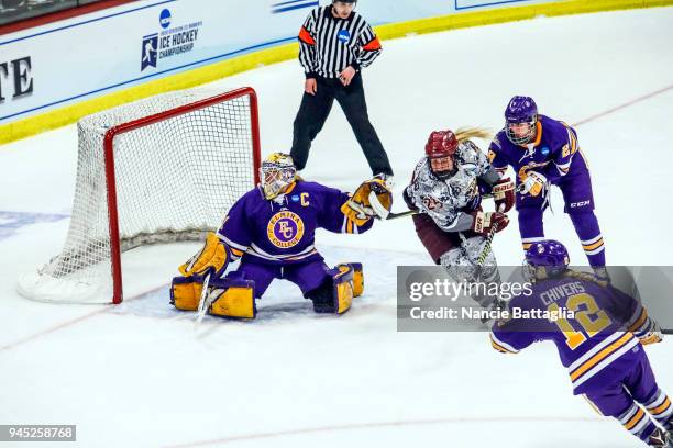 Elmira College goalie, Kelcey Crawford, follows the puck during the Division III Women's Ice Hockey Championship, between Norwich University and...