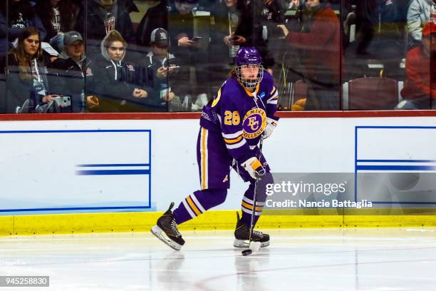 Sydney Harris, of Elmira College, skates with the puck during the Division III Women's Ice Hockey Championship, between Norwich University and Elmira...