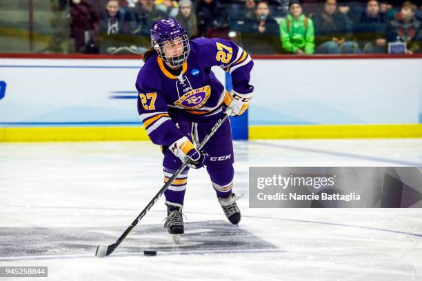 Katie Granato, of Elmira College, skates with the puck during the Division III Women's Ice Hockey Championship, between Norwich University and Elmira...