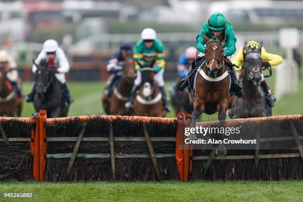 Daryl Jacob riding We Have A Dream clear the last to win The Doom Bar Anniversary 4-Y-O Juvenile Hurdle at Aintree racecourse on April 12, 2018 in...