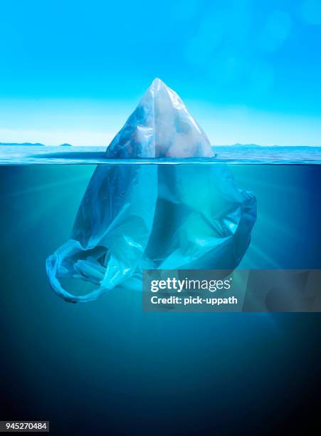 iceberg or plastic bag - ocean cross section stock pictures, royalty-free photos & images