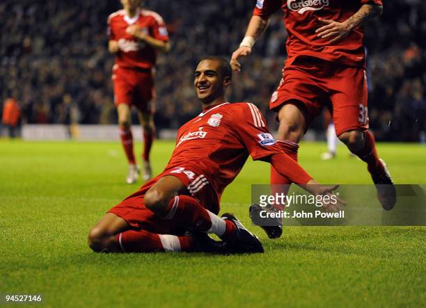 David Ngog of Liverpool celebrates afer scoring against Wigan Athletic during the Barclays Premier League match between Liverpool and Wigan Athletic...