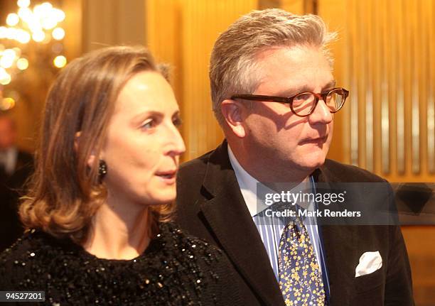 Princess Claire of Belgium and Prince Laurent of Belgium assist in a Christmas concert at the Royal Palace on December 16, 2009 in Brussels, Belgium.