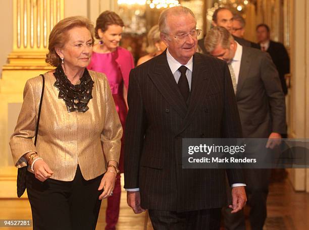 Queen Paola of Belgium and King Albert of Belgium assist in a Christmas concert at the Royal Palace on December 16, 2009 in Brussels, Belgium.