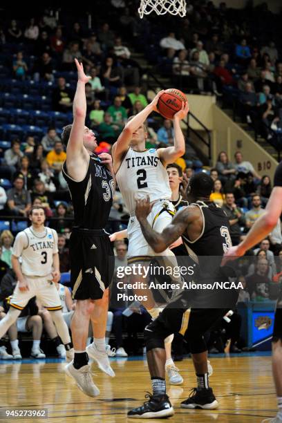 Ben Boots of Univ. Wisconsin-Oshkosh puts up a lay-up during the Division III Men's Basketball Championship held at the Salem Civic Center on March...