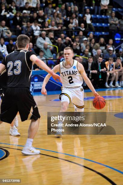 Ben Boots of Univ. Wisconsin-Oshkosh dribblesup the court during the Division III Men's Basketball Championship held at the Salem Civic Center on...