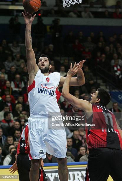 Ioannis Bourousis, #9 of Olympiacos Piraeus competes with Milko Bjelica, #11 of Lietuvos Rytas in action during the Euroleague Basketball Regular...