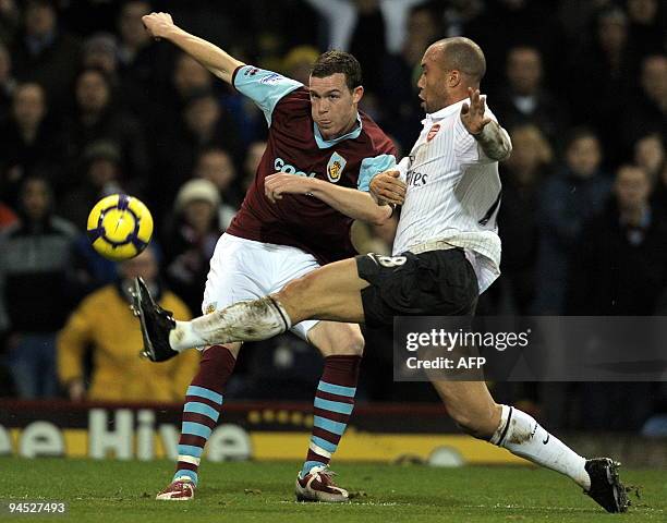 Burnley's Scottish midfielder Kevin McDonald vies with Arsenal's French defender Mikael Silvestre during the English Premier League football match at...