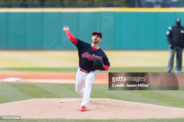 Starting pitcher Josh Tomlin of the Cleveland Indians pitches during the first inning against the Detroit Tigers at Progressive Field on April 10,...