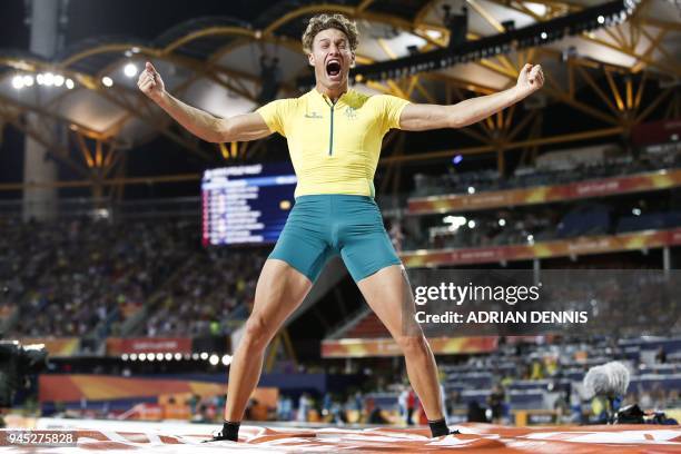 Australias Kurtis Marschall celebrates in the athletics men's pole vault final during the 2018 Gold Coast Commonwealth Games at the Carrara Stadium...