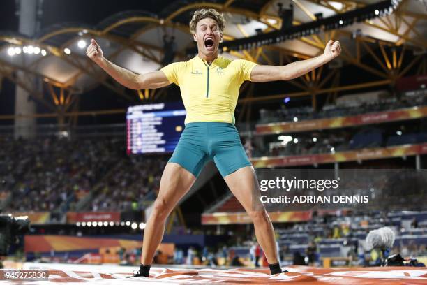 Australias Kurtis Marschall celebrates in the athletics men's pole vault final during the 2018 Gold Coast Commonwealth Games at the Carrara Stadium...